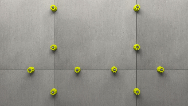 How should you use leveling spacers for tile wall installations
